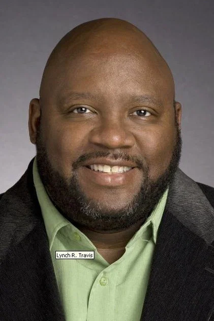 LYNCH R. TRAVIS