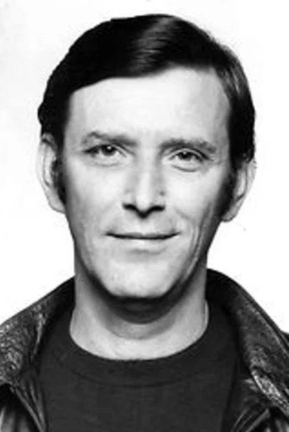 TOM BELL